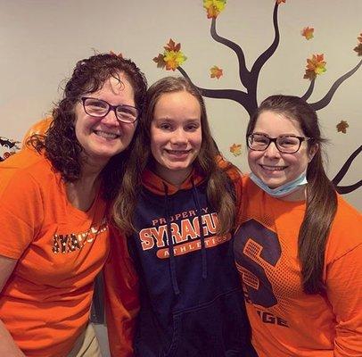 Jaden and assistants, Midge & Talitha, with #SU gear on! Wear your SU gear on game days when you come to the office for extra points!