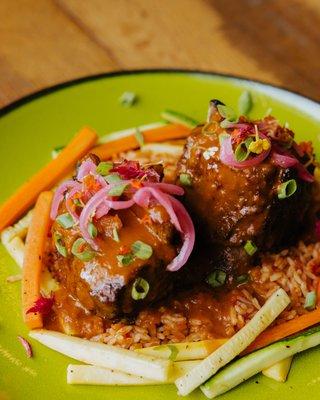 SHORT RIBS - MEXICAN STYLE Two beef short ribs braised with red wine, beef stock, chipotle and tomato until it's fall-off-the-bone tender.