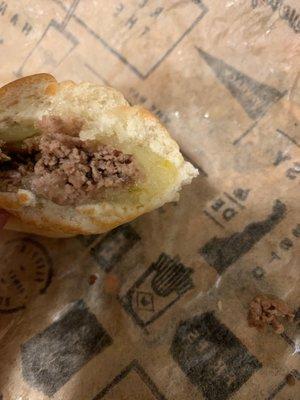 Philly cheese steak. That isn't an onion you're looking at.