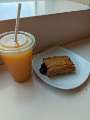 Fresh squeezed orange juice and guava and cheese pastry