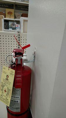 The fire extinguisher that fell and broke my toe while shopping in Michaels.