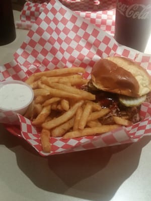 Pulled pork sandwich, with the best beer battered fries I have ever had.