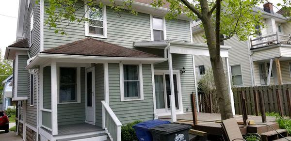 Exterior Painting in Lakewood, Oh
 Colors: 
 Body - Sherwin Williams Evergreen Fog 9130
 Trim - Sherwin Williams Extra White 7006