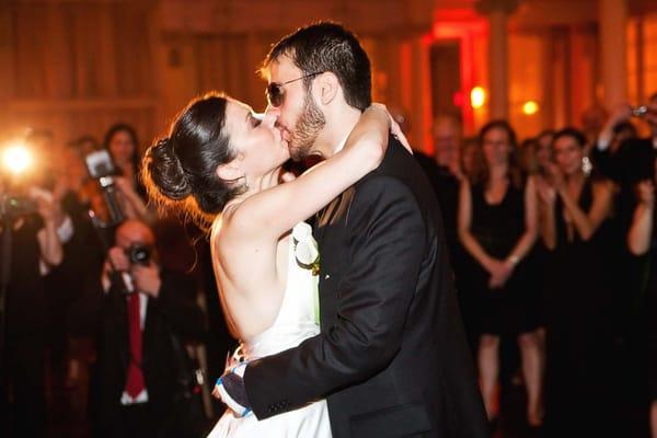 Kissing bride and groom