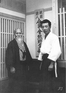 The founder of Aikido, Morihei Ueshiba, with Hikitsuchi Sensei