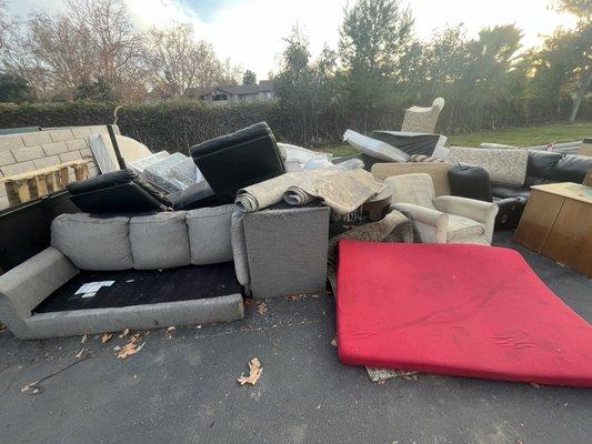 Soiled mattresses covering 4 parking spaces. This is our view from our window daily