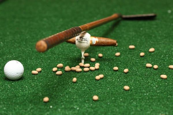 Hole in One Cigar Holder can be used to hold your cigar or club!