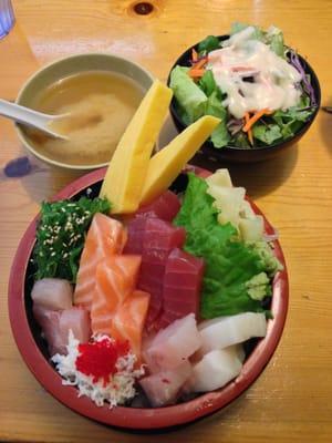 Chirashi sushi, freshly cut assorted raw fish over rice, served with soup and salad. $15.95 for lunch, $16.95 for dinner.