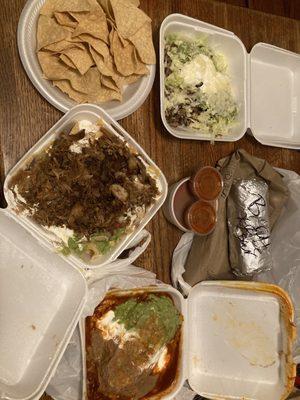 rice bean cheese (RBC) burrito, wet carnitas CA burrito, carnitas nachos, chips (salsa in the middle), & carne asada sopes