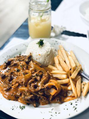 Brazilian stroganoff with caju juice.