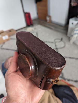 Very different leather color and texture used for the top repair