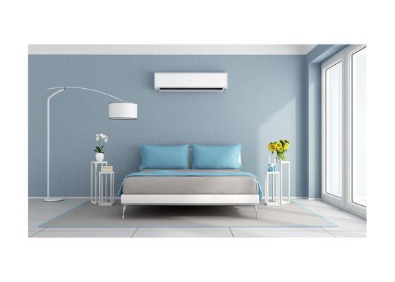 Sleek Bedroom with a wall mounted ductless unit