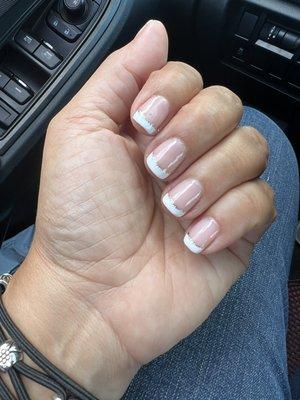 French gel polish with silver accent.