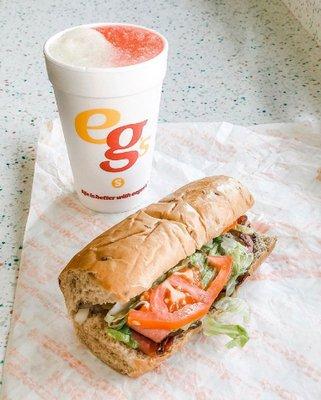 Delicious sub sandwich and a lemon and strawberry eegee.