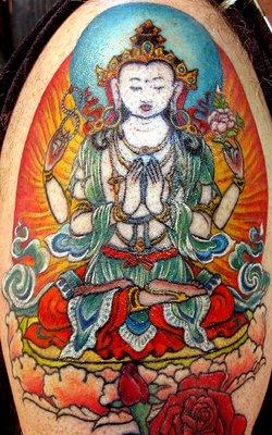 Avalokitesvara - on my husband's right upper arm.  Tattoo by Stacey Sharp.