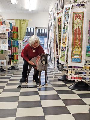 Owner Marcie Ford with her shy rescue pup who sometimes visits the store