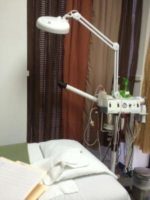 Inside of one of their consultation rooms with a microdermabrasion machine