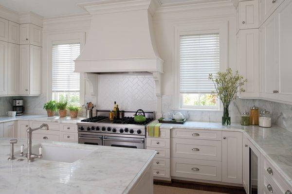 White Faux Wood blinds.