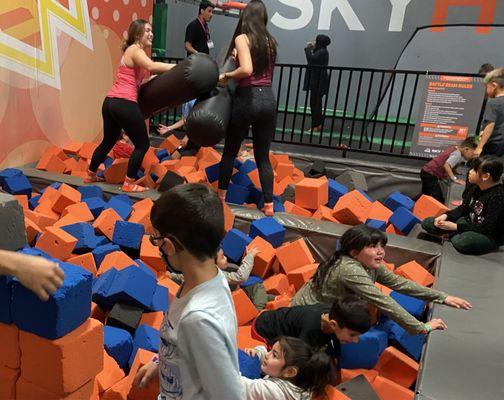 Overcrowded foam pit - right before the teens fell onto a small child.