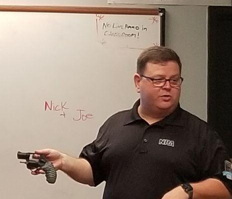 Joe teaching a block of Instruction on how to properly safety clear a revolver