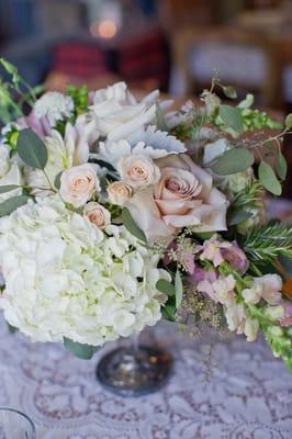 Beautiful floral arrangements on tables!