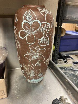 Charcoal clay, turquoise under glaze  Carved