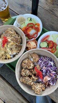 Tofu Katsu Don and Karaage with side salads and kimchi