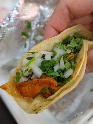 Folded spicy chicken taco