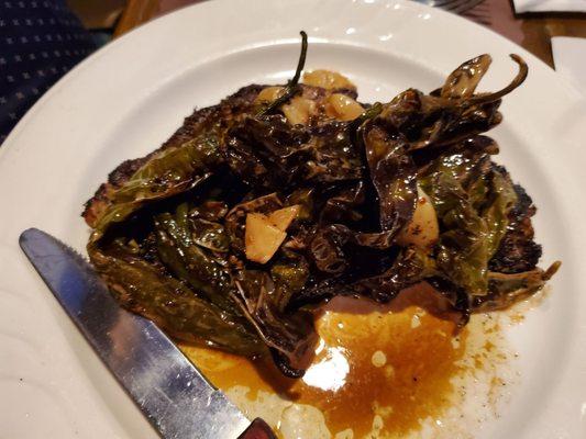 Delmonico steak with garlic and an insane amount of long hots