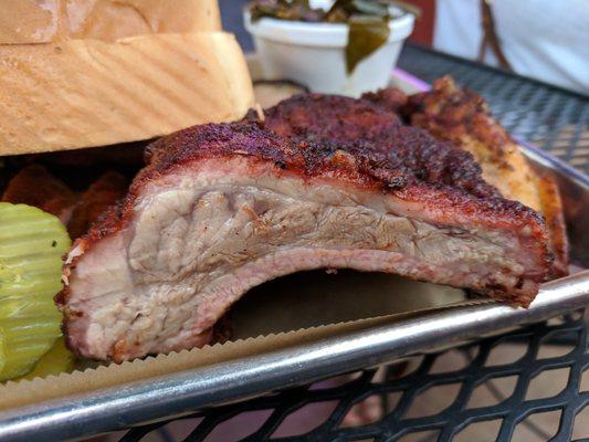 Cross section of dry-rub ribs. Part of the Pitmaster combo (4 meats and 2 sides for $25.95).