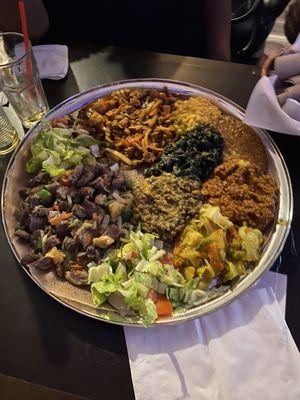 Ethiopian platter with lamb; chicken; and beef