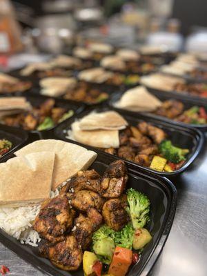 Mediterranean chicken with sautéed veggies, rice pilaf and pita bread. DELICIOUS!