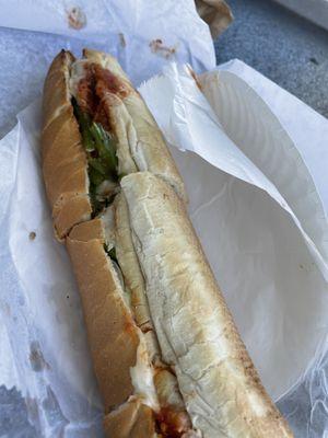 Large unimpressive $15 meatball sub.