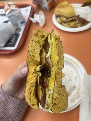 Bacon egg and cheese on an egg everything bagel.