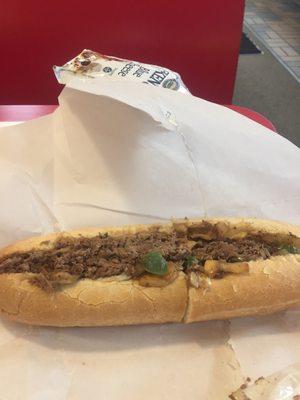 Large Steak Bomb. $9.80 -"famous" Steak Sub w/ Onions, Green Peppers, Mushrooms "topped with melted cheese".