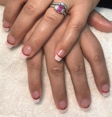 My Christmas manicure! French which my hubby lives with a bit of sparkle and red for a candy cane look. Loved them.