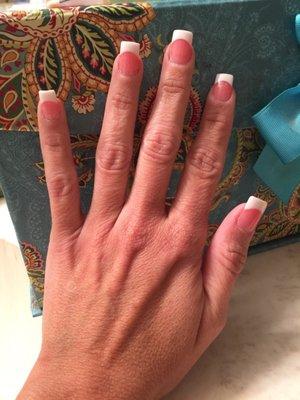 Kevin did a great job on my pink and whites! Que gives a great pedicure- both best I've had in YEARS!!! Clean, friendly salon!