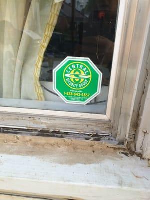 The old Central Security Group sign that was on a window at my house when I moved in. It has since been updated!