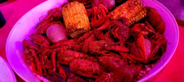 Boiled crawfish with turbo seasoning, corn, and potatoes