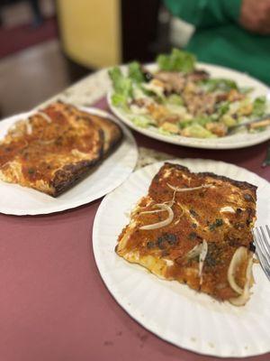 Amazing slices w a Caesar salad W Grilled chix hiding in the back!!