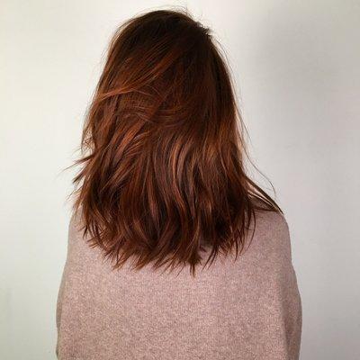 Perfect cinnamon brown hair-color with hints of balayage and a long layered haircut Shape and texture by joshua Rossignol