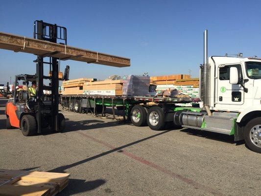 Engineered wood products being loaded on to Dixieline trucks ready to deliver to client's jobsite.