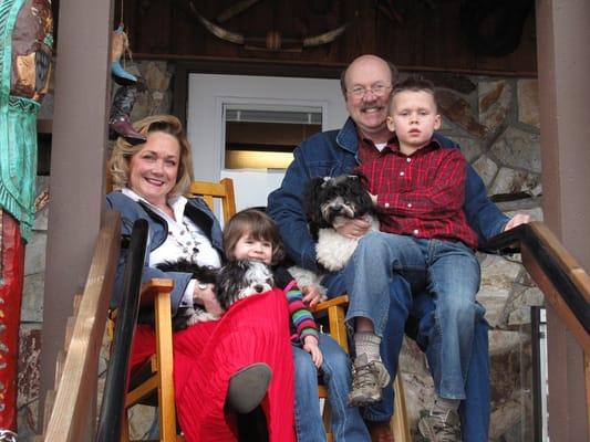 George and Martha Sutton with grandkids and puppies!