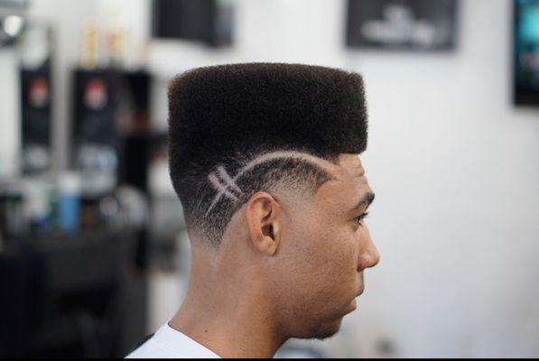 Taper flat top with design by Marcus Vigil