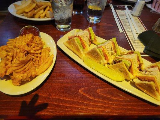 Club sandwich and fries