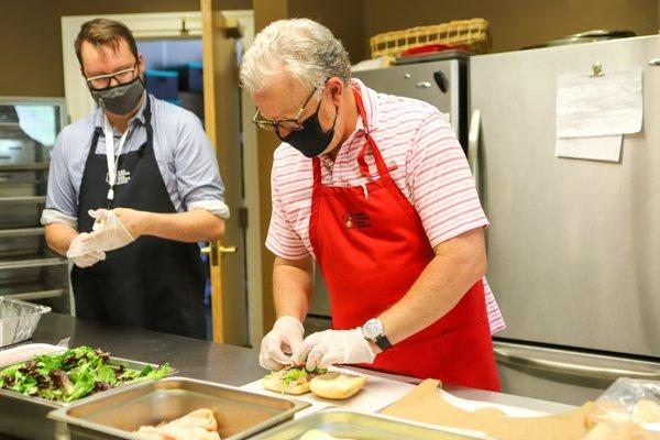 Gary Wagner prepares meals for families at RMHC NEO