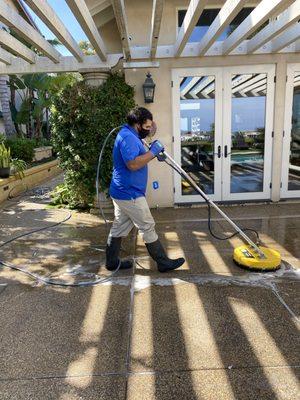 Edgar is helping get rid of slippery green mold / algae on this back patio. Thanks Edgar!