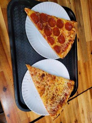 A slice of cheese and a slice of pepperoni.