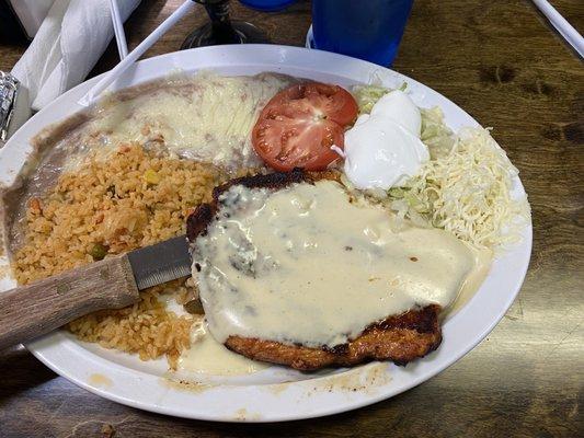 Chicken with rice and beans.