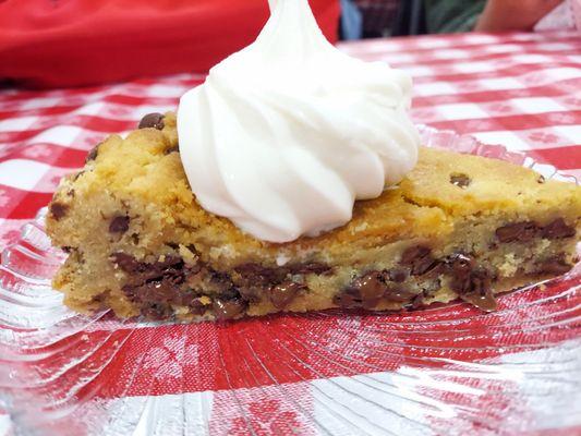 The cookie cake with vanilla ice cream